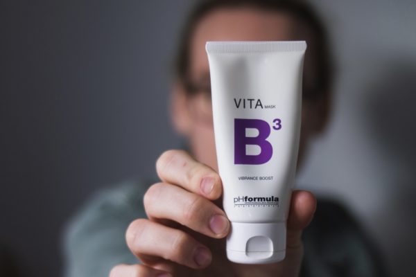 A bottle of Vita b3, promoting as a source of reliable Skincare Ingredients
